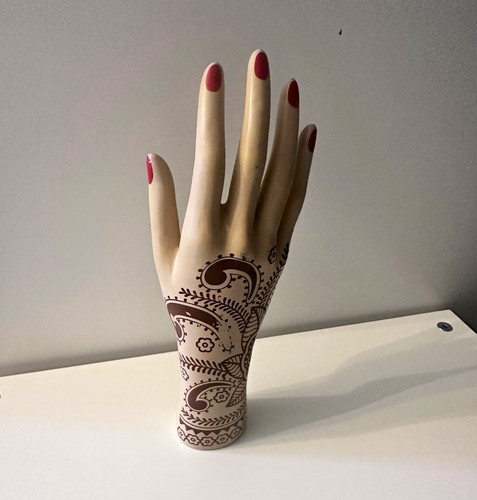 Mannequin hand with henna
