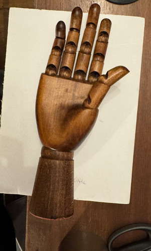 Dark brown wooden articulated